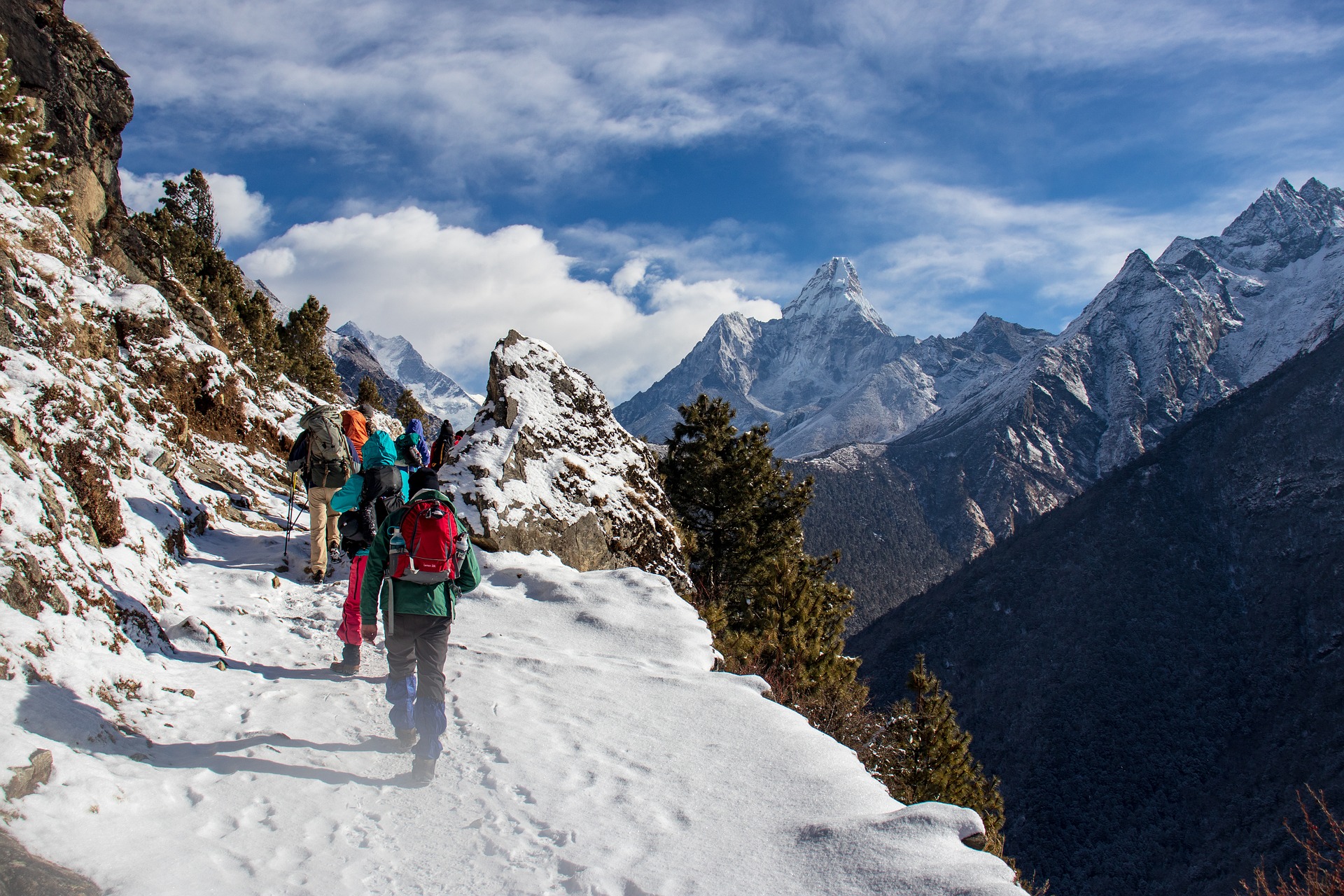 Trekking through the Himalayas.